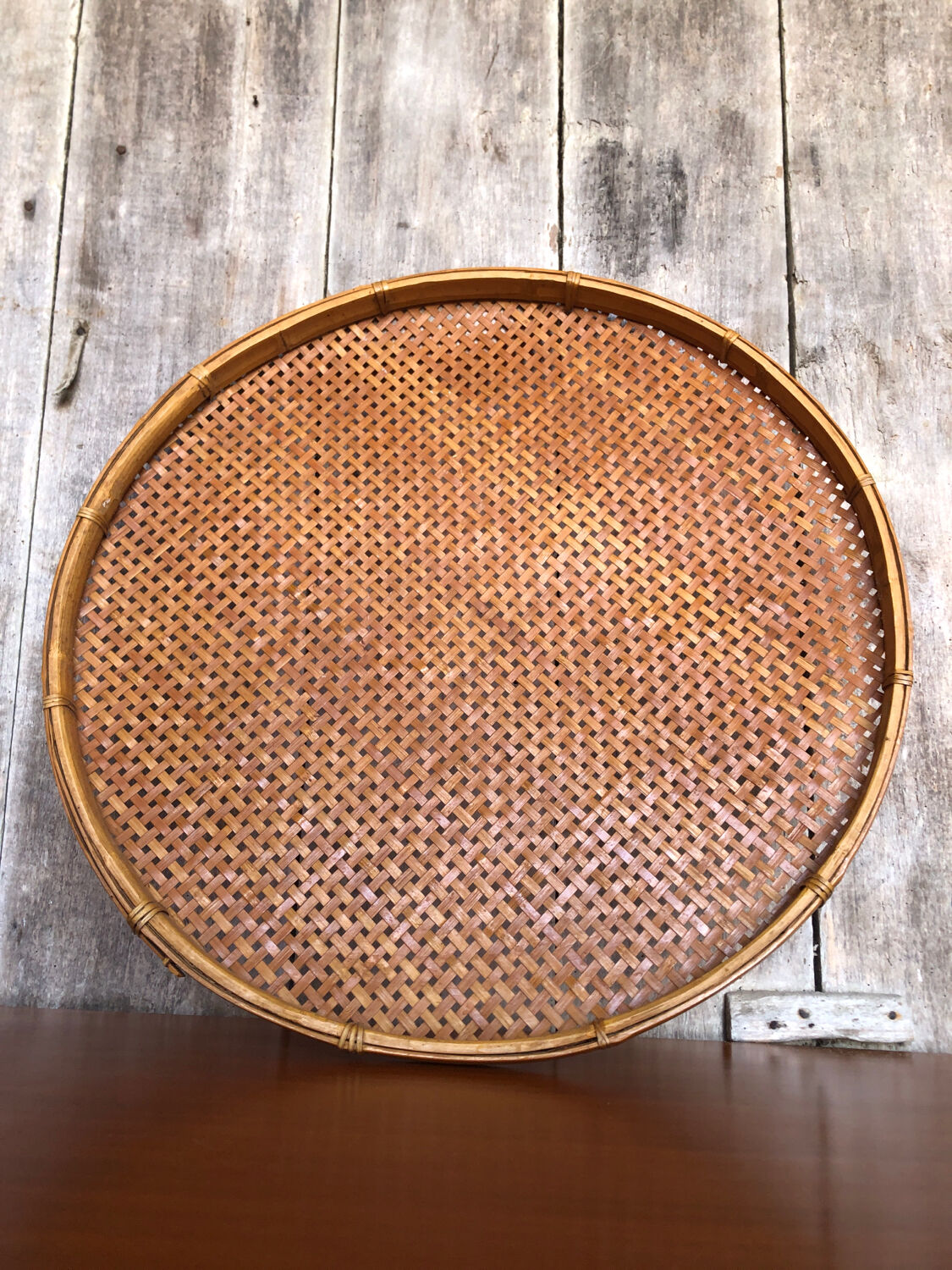 Old vintage braided wicker sieve