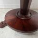 Empire style round table with claw feet, 19th century.