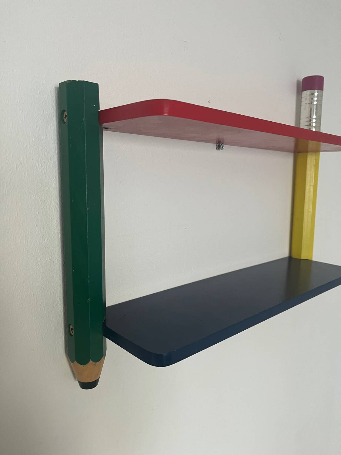 Wall shelf by Pierre Sala giant crayons from the 80s.