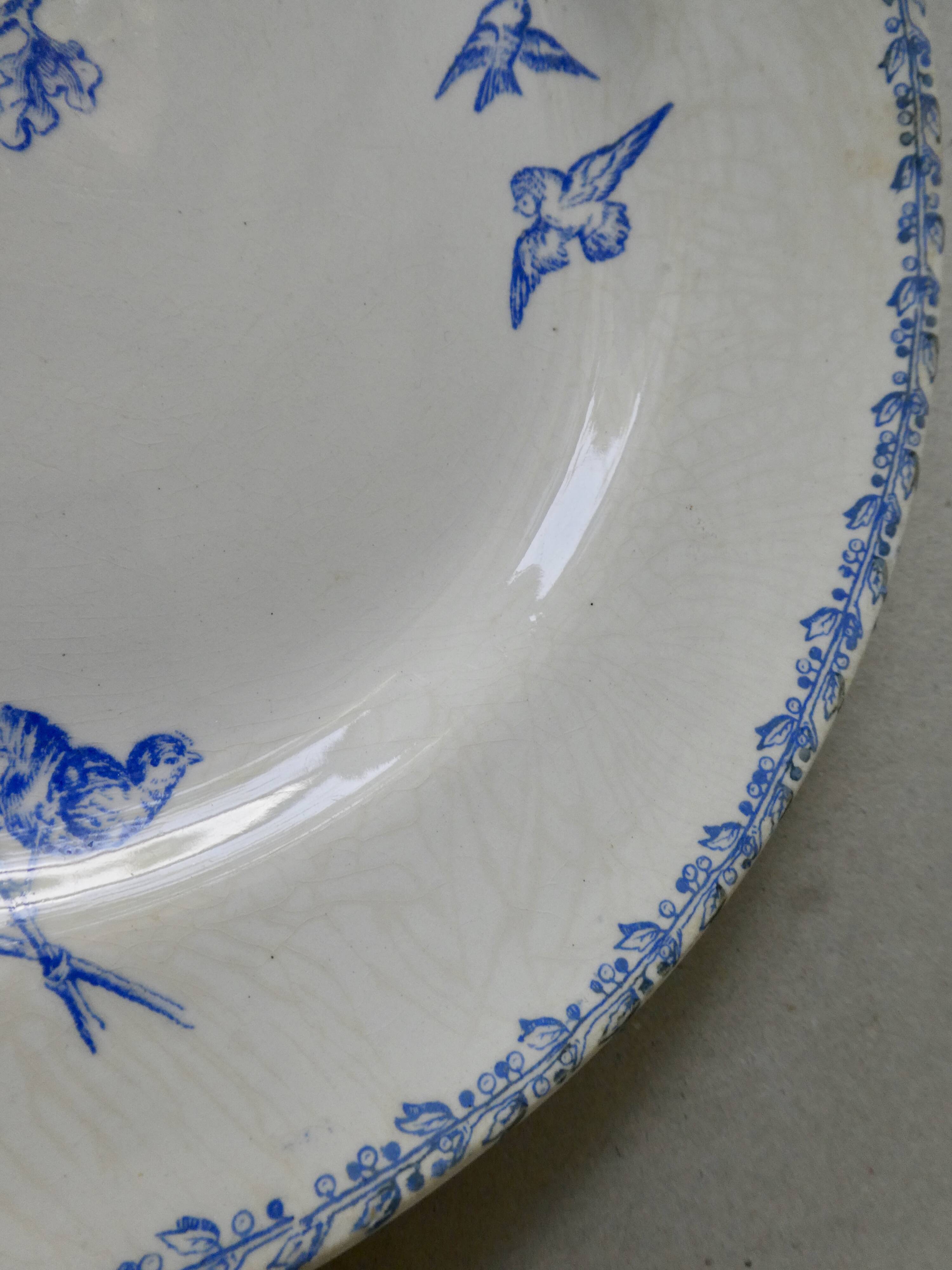 Set of 2 plates in earthenware, 1900
