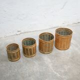 Series of 4 vintage rattan basket pot covers