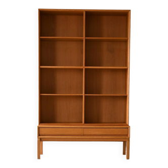 Oak bookcase with drawers