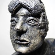 20th-century ceramic bust of a woman, an unidentified piece of art.