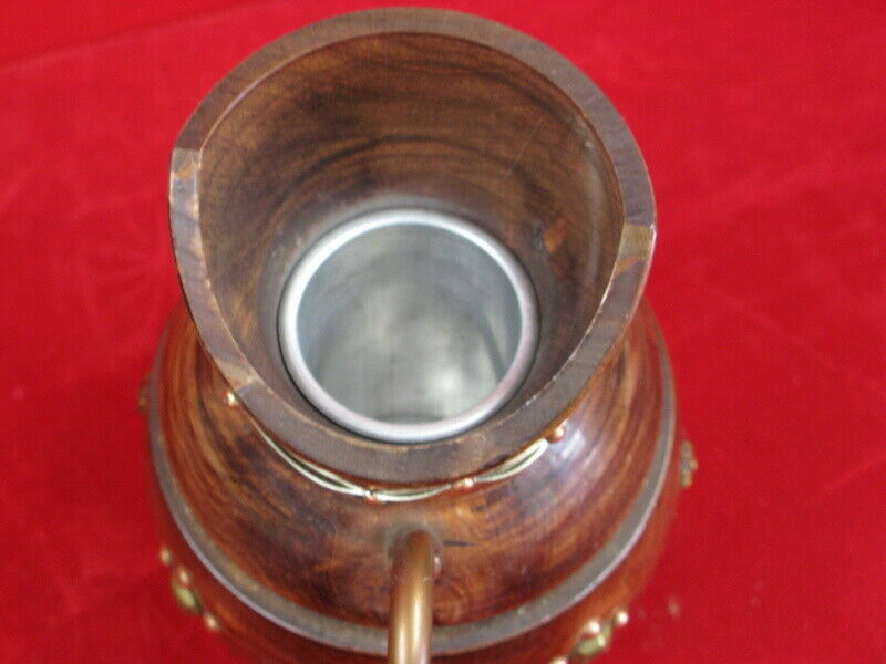 Wooden pitcher and vintage copper decoration