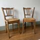Set of 2 old mulched wooden chairs