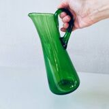 Blown and bubbled glass pitcher