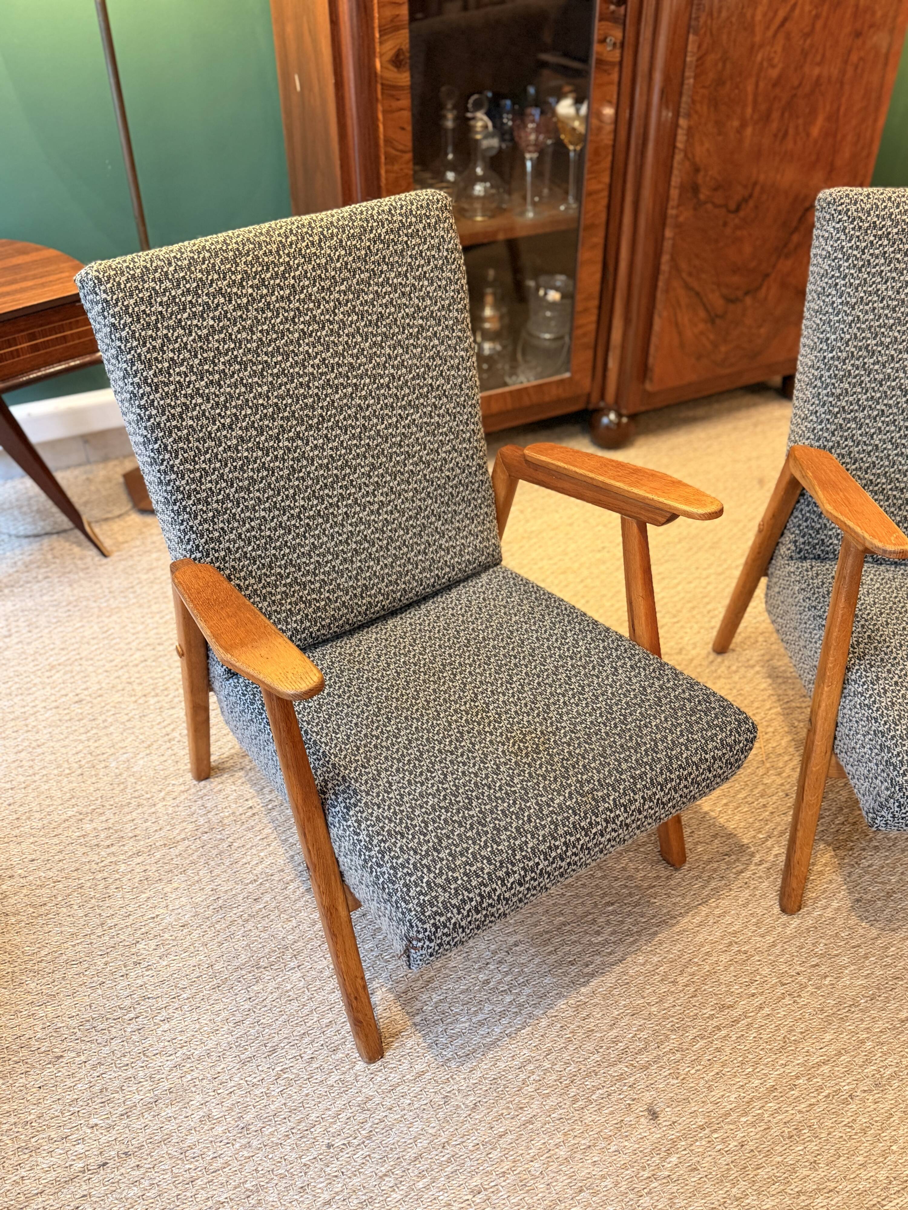 Pair of vintage oak armchairs, original fabric and seat.