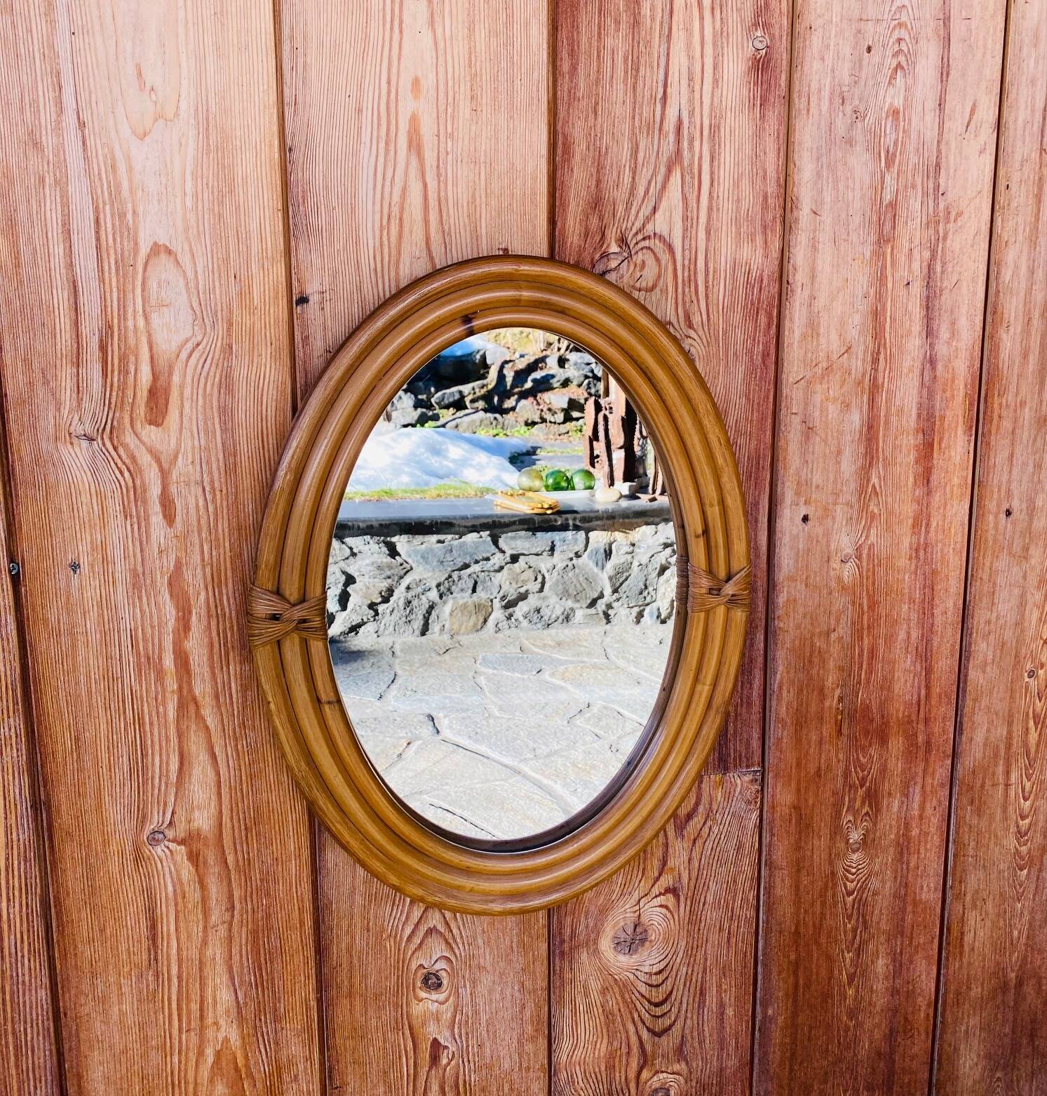 Vintage oval rattan mirror
