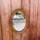 Vintage oval rattan mirror