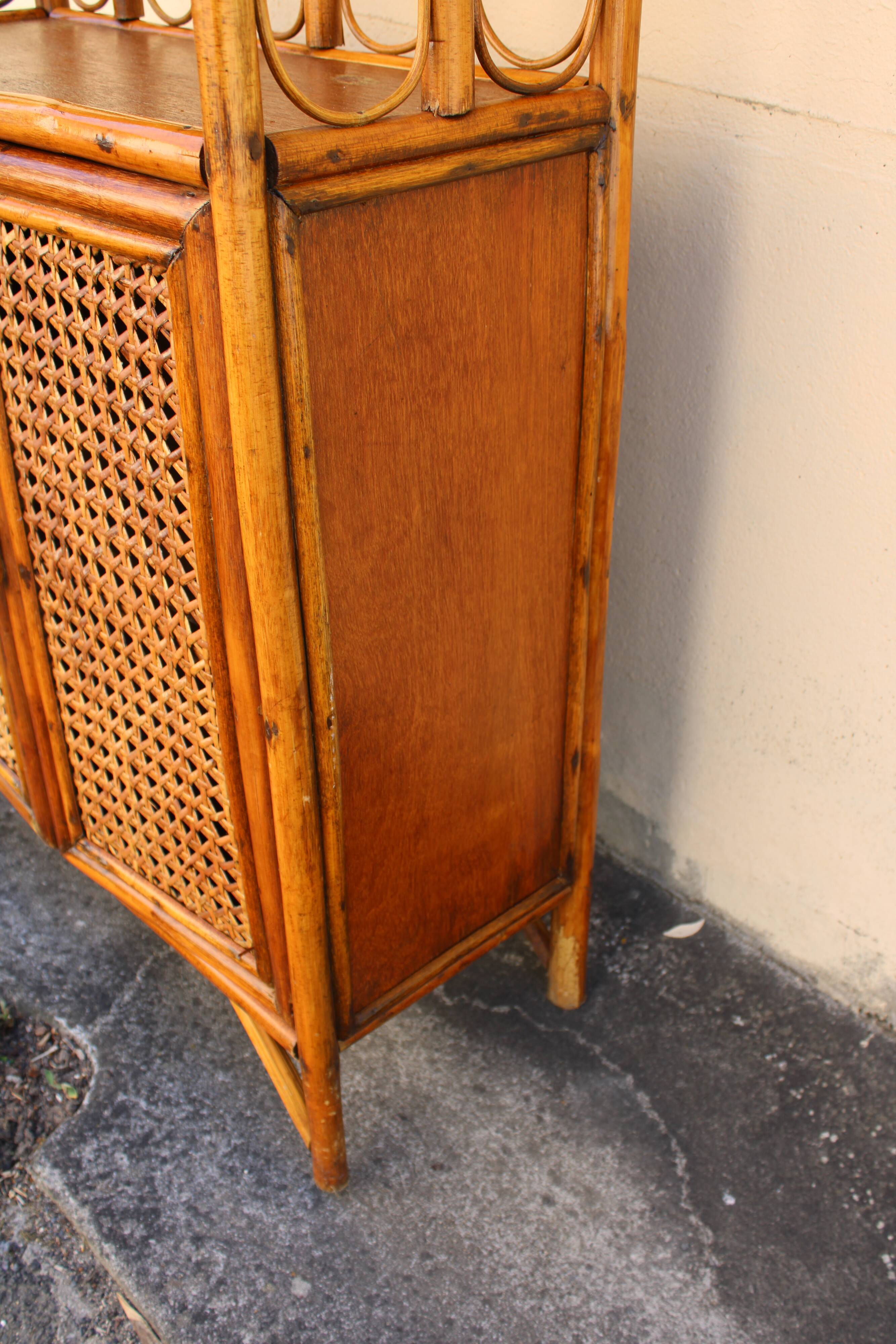 Bookcase in rattan and canning