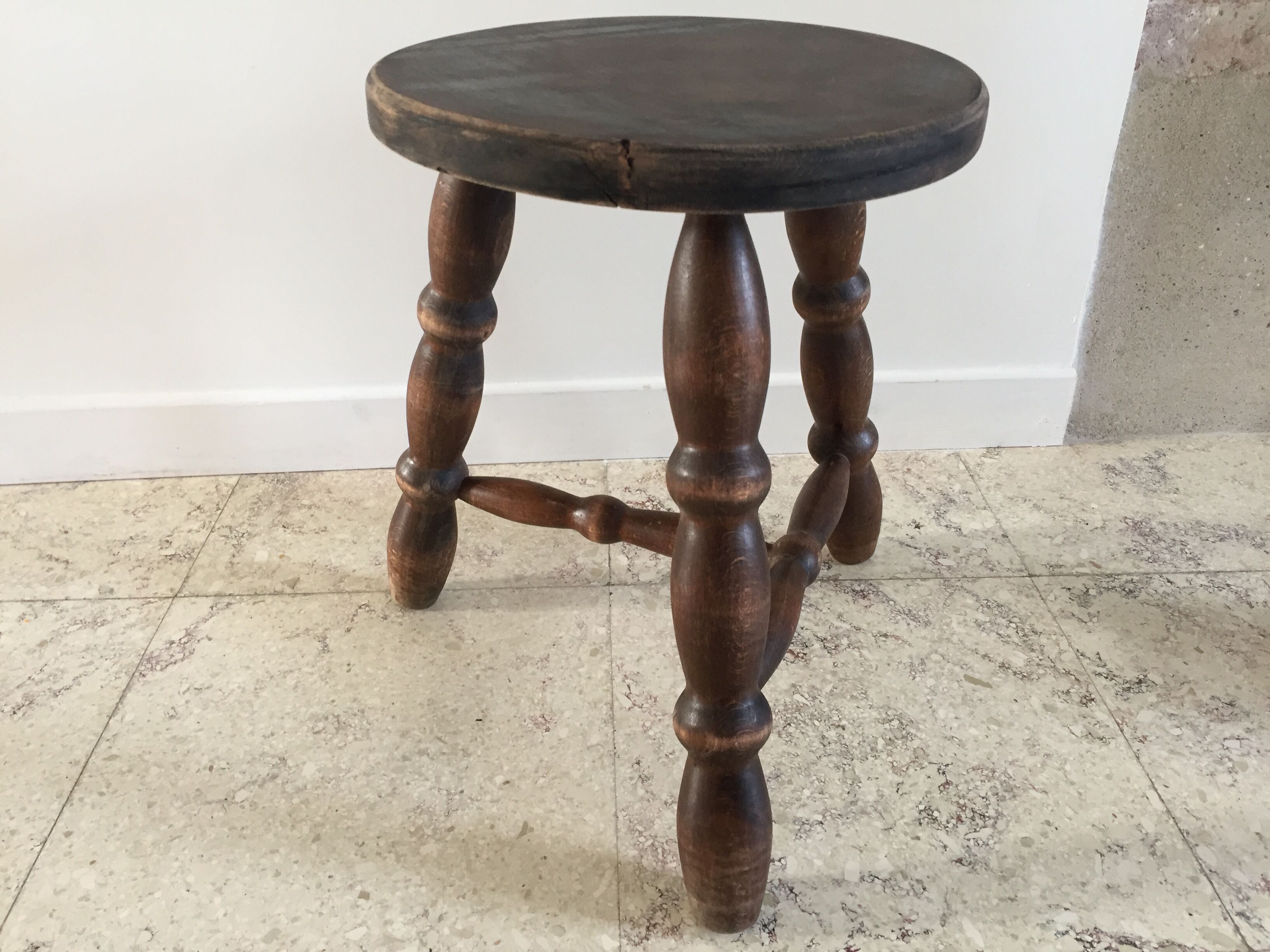 Wooden stool turned vintage tripod