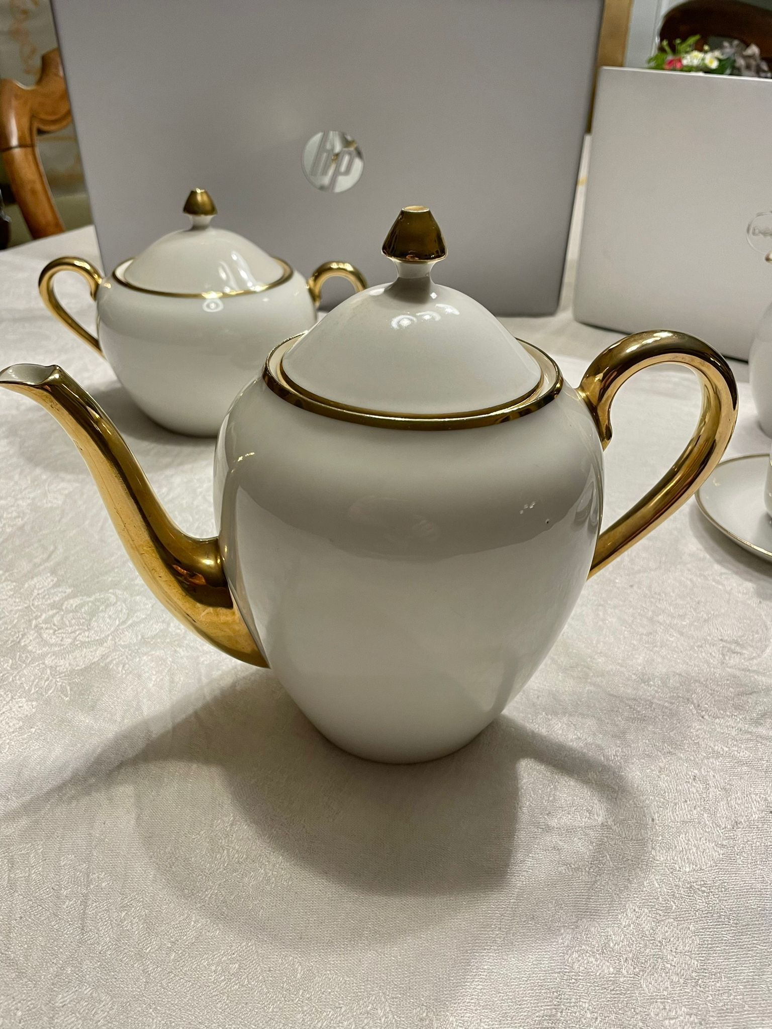 White and gold porcelain breakfast set