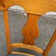 4 Landes chairs with solid wood frames and grey fabric.