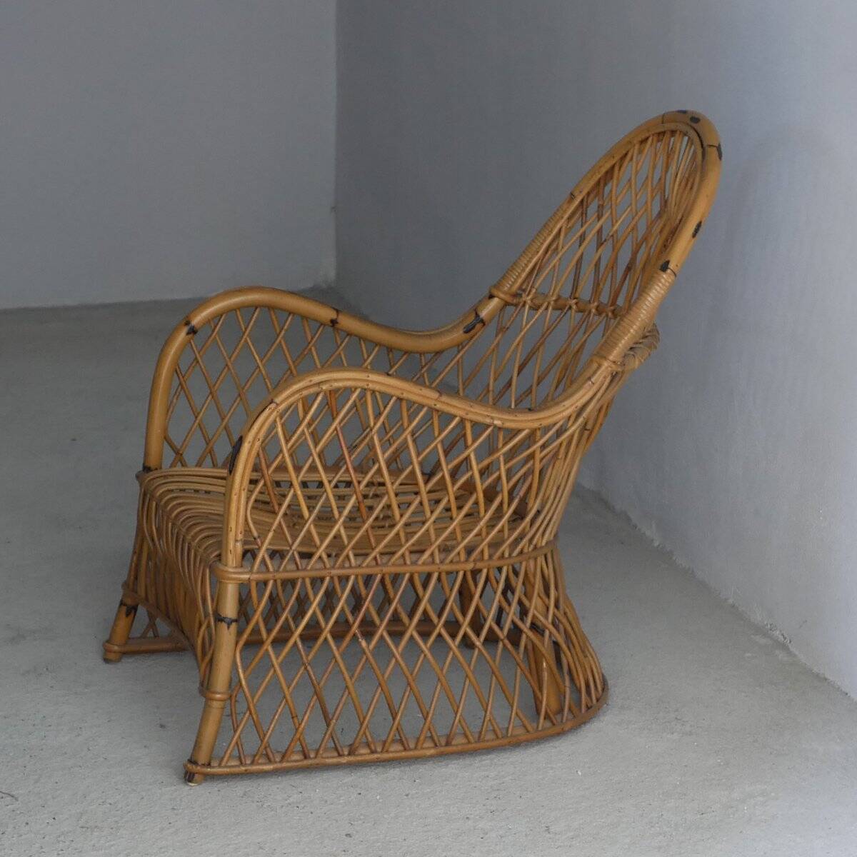 Fauteuil en rotin Gervasoni, années 1960