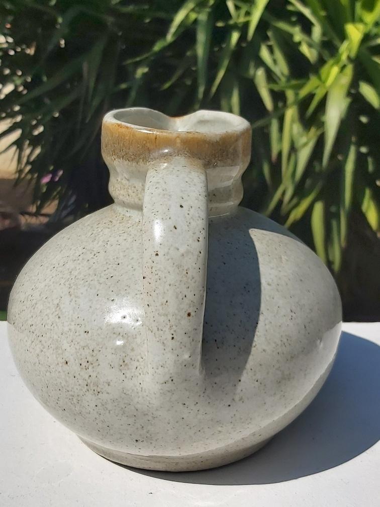 Pitcher Jean Austruy in sandstone