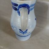 2 antique stoneware pitchers