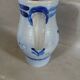 2 antique stoneware pitchers