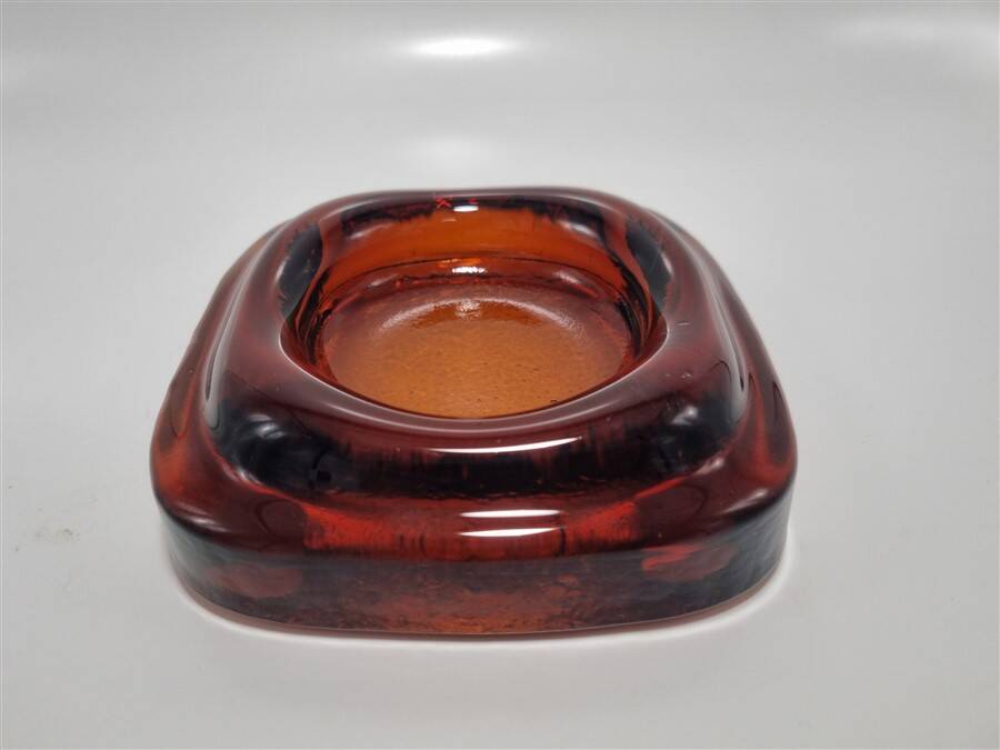 Amber glass pocket emptier