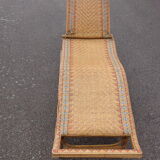 Bain de soleil, chaise longue en rotin
