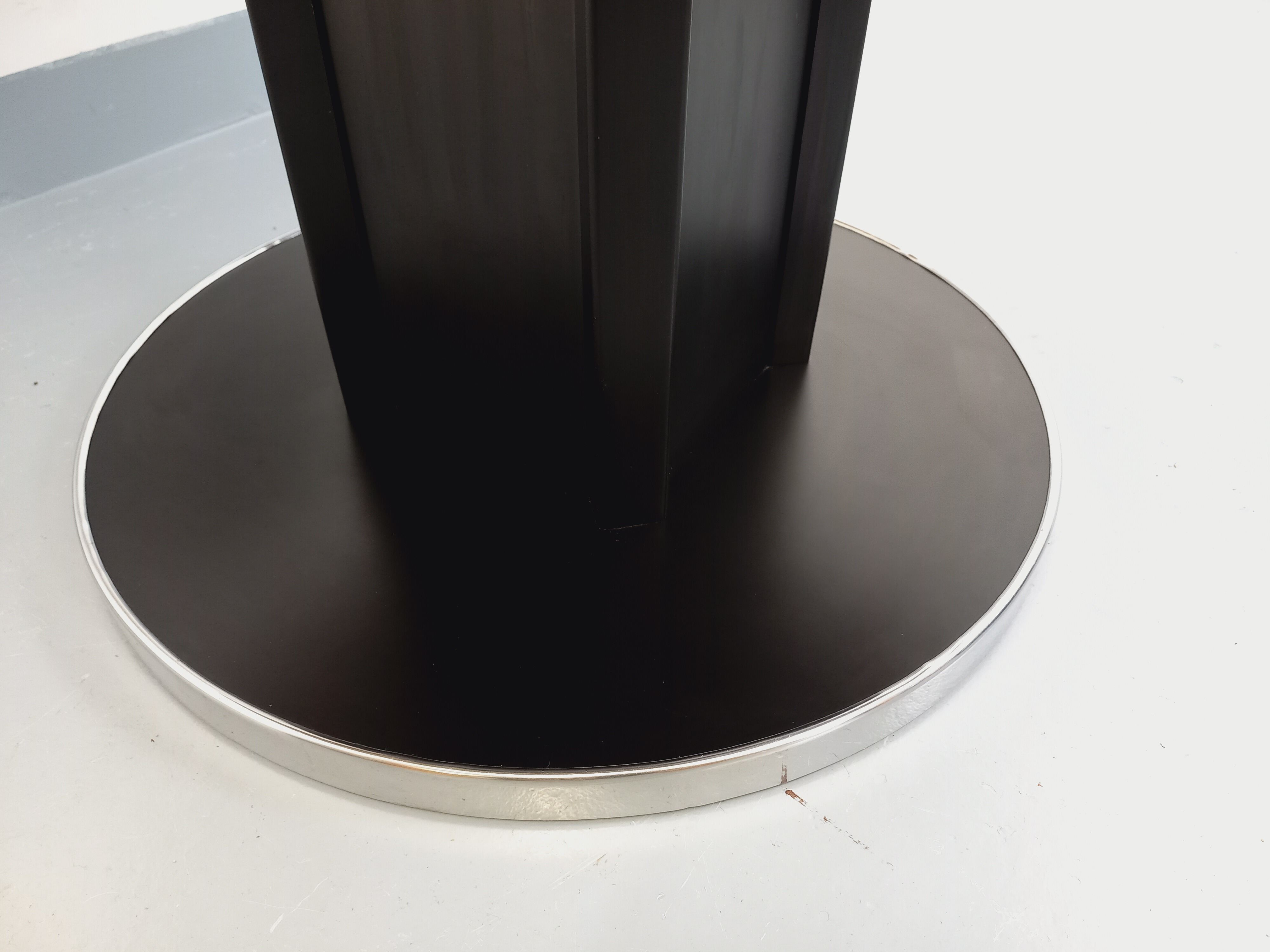 Vintage dining table in melamine with a black wood effect and chrome metal.