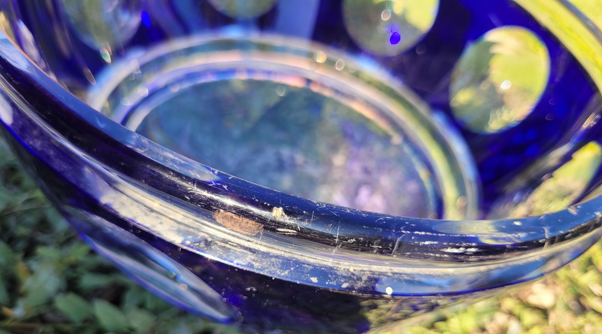 cobalt blue glass bowl with round lenses