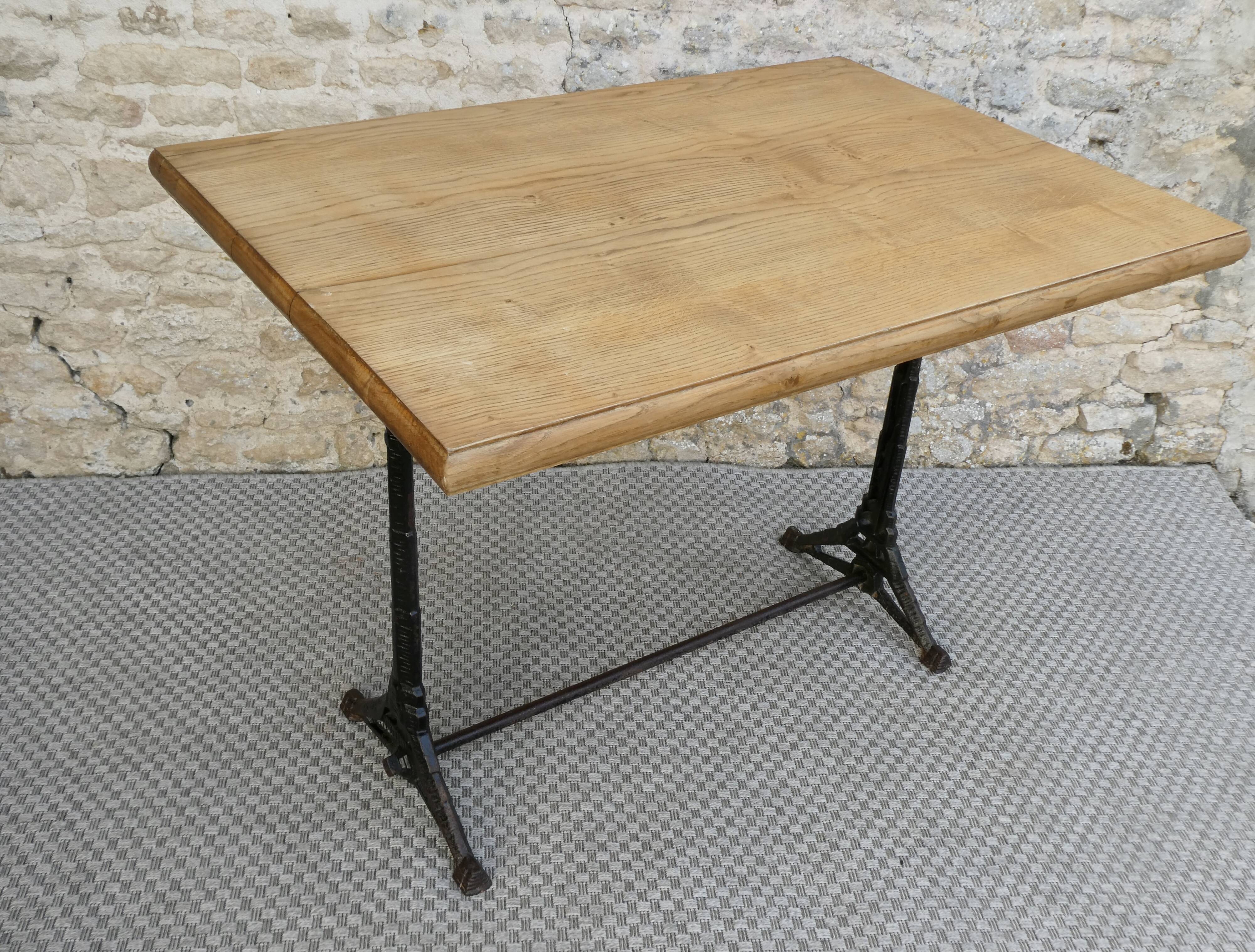bistro table with cast iron legs signed Lelong, early 20th century