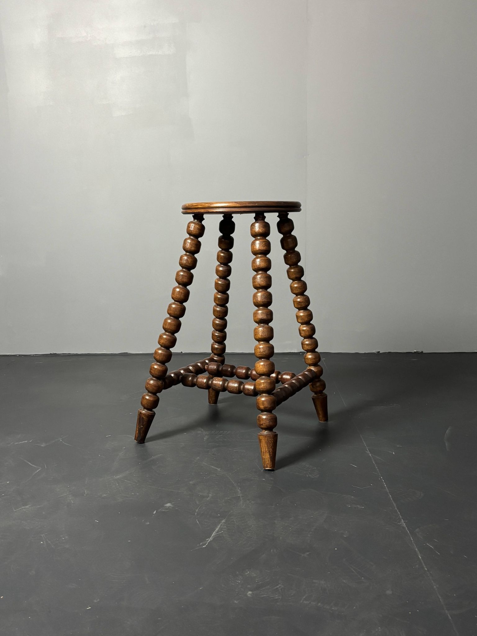 Midcentury brutalist wood turned stool in the style of Charles Dudouyt, 50s