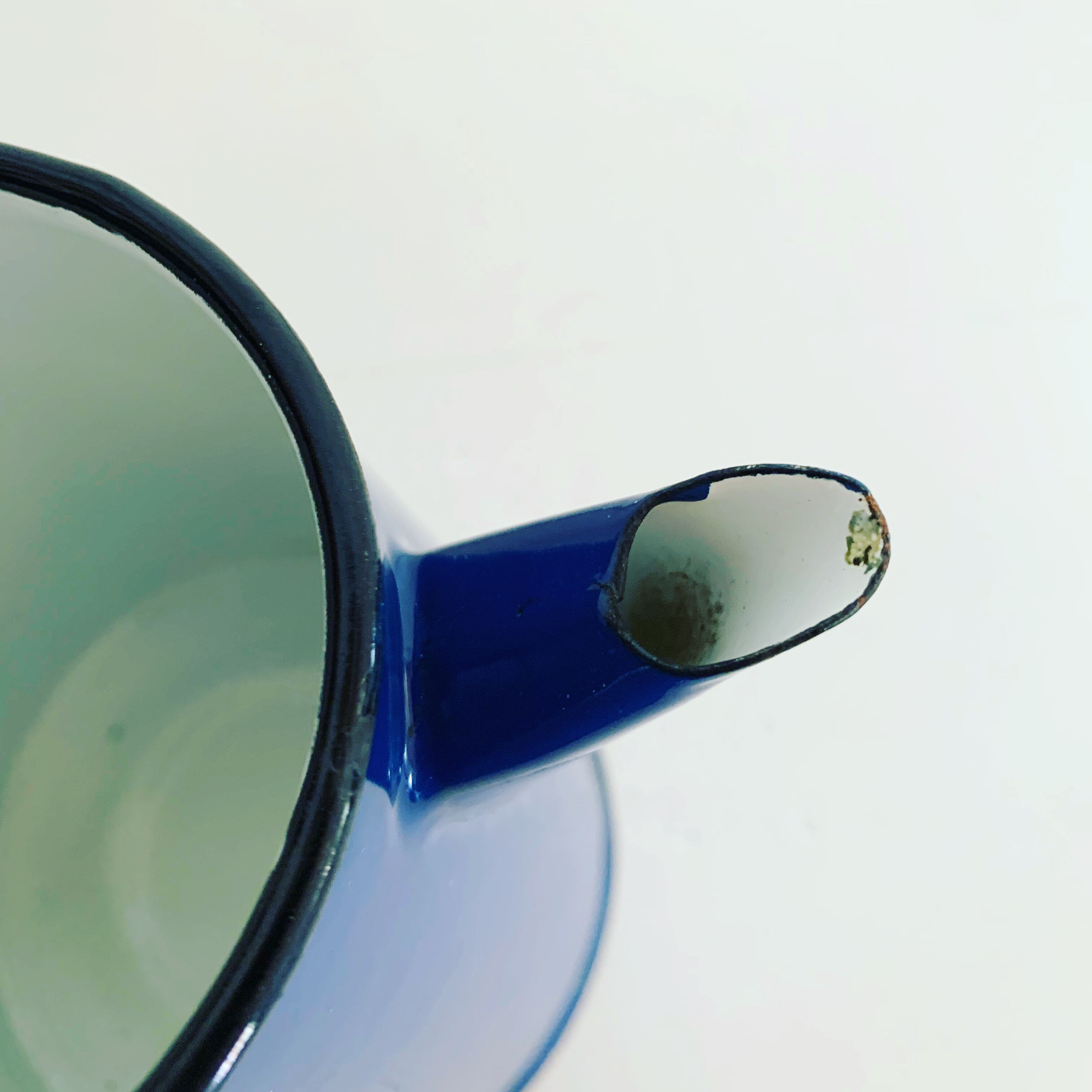 Vintage blue and black enamel coffee pot