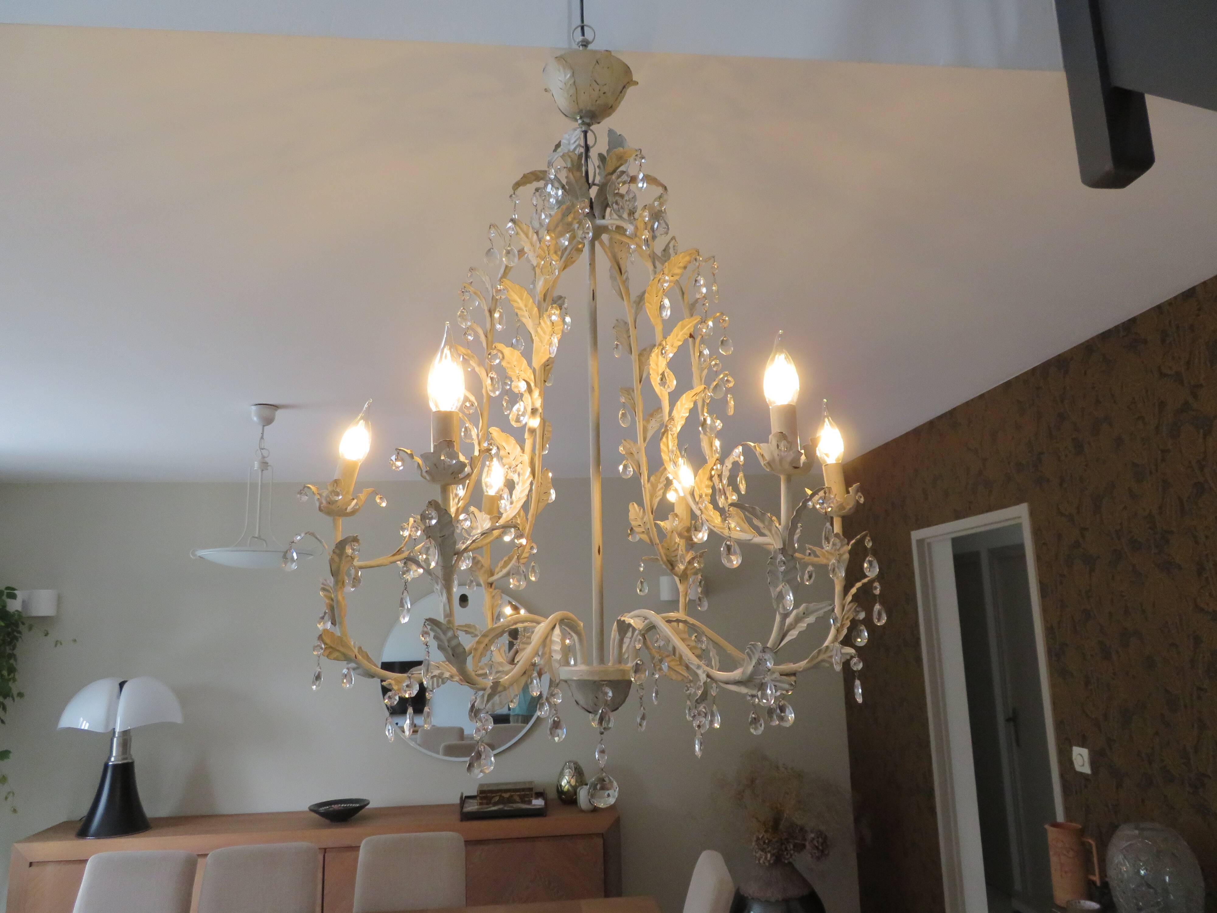 Large cage chandelier in aged metal.
