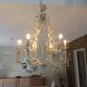 Large cage chandelier in aged metal.