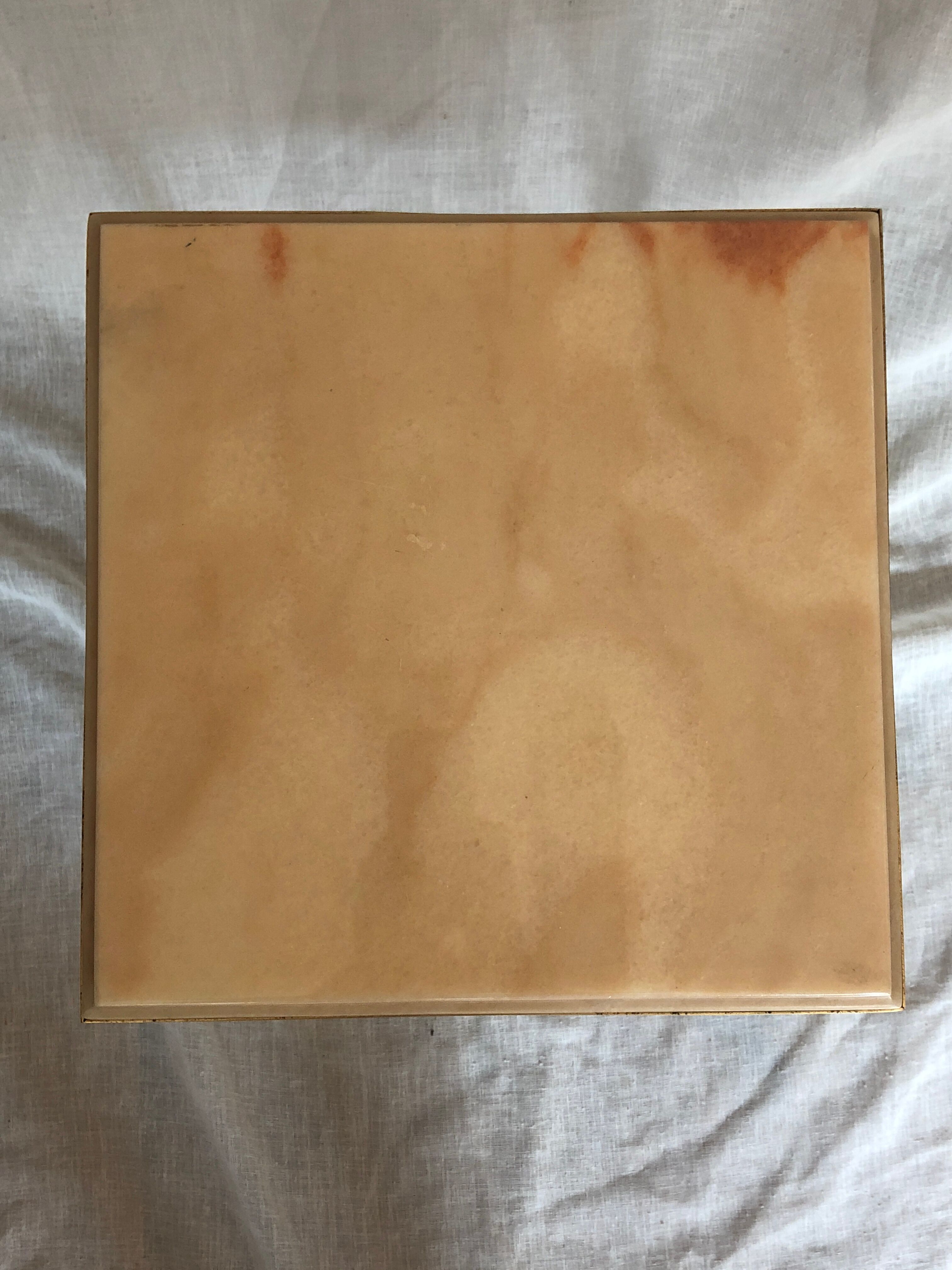 Spot like that marble and brass