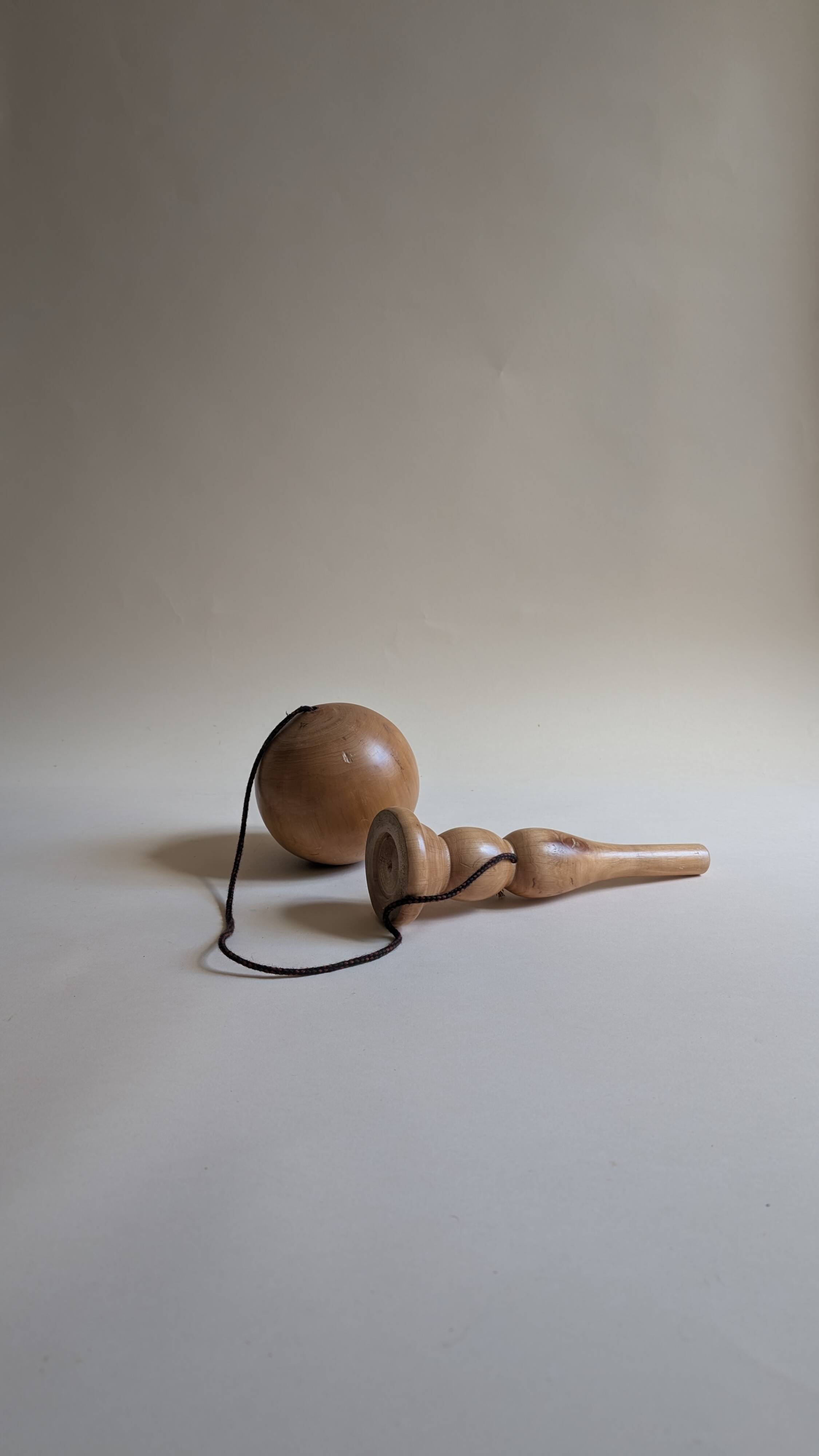 Large wooden cup and ball game