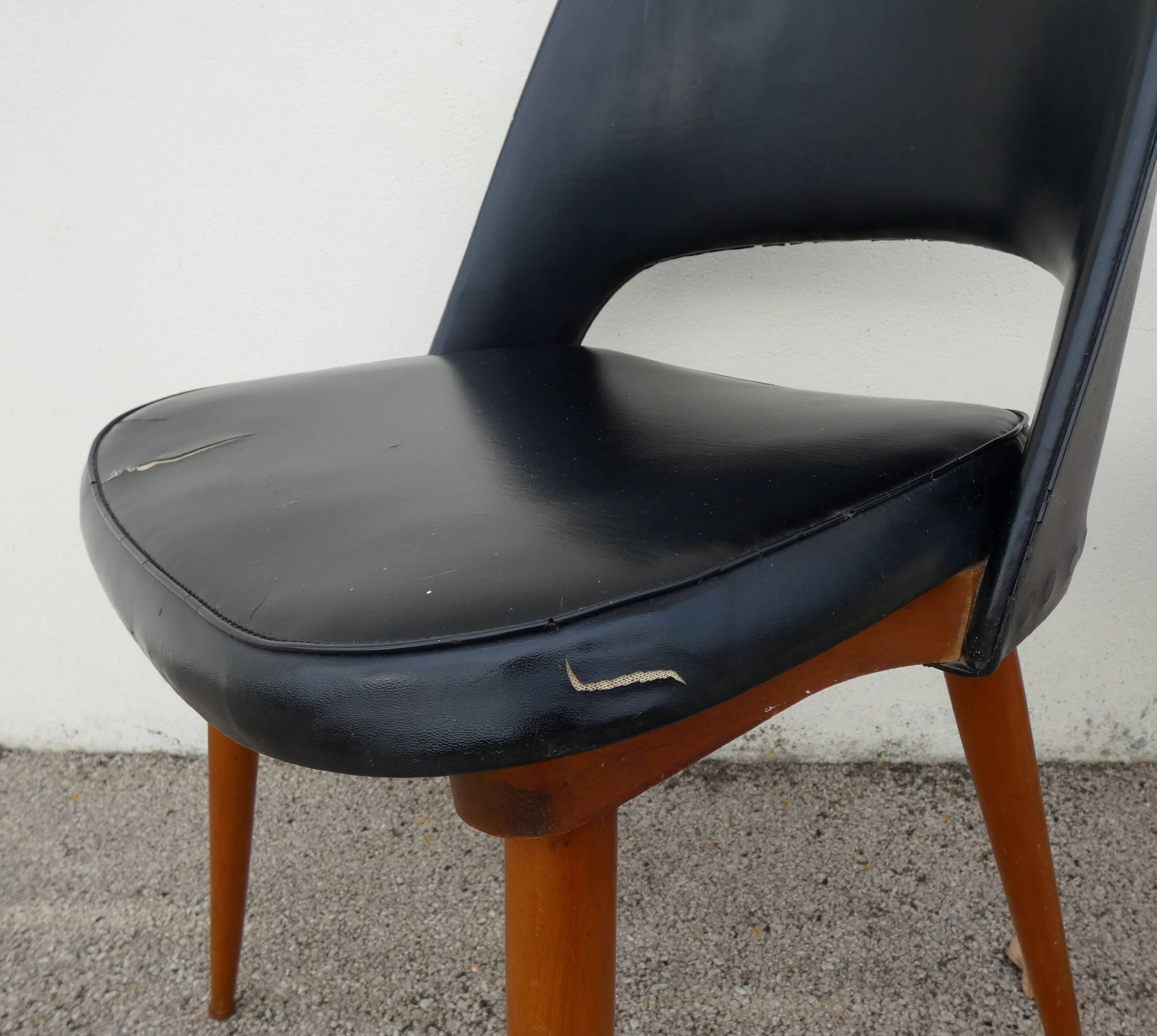 2 chairs in black skai compass legs Louis Paolozzi