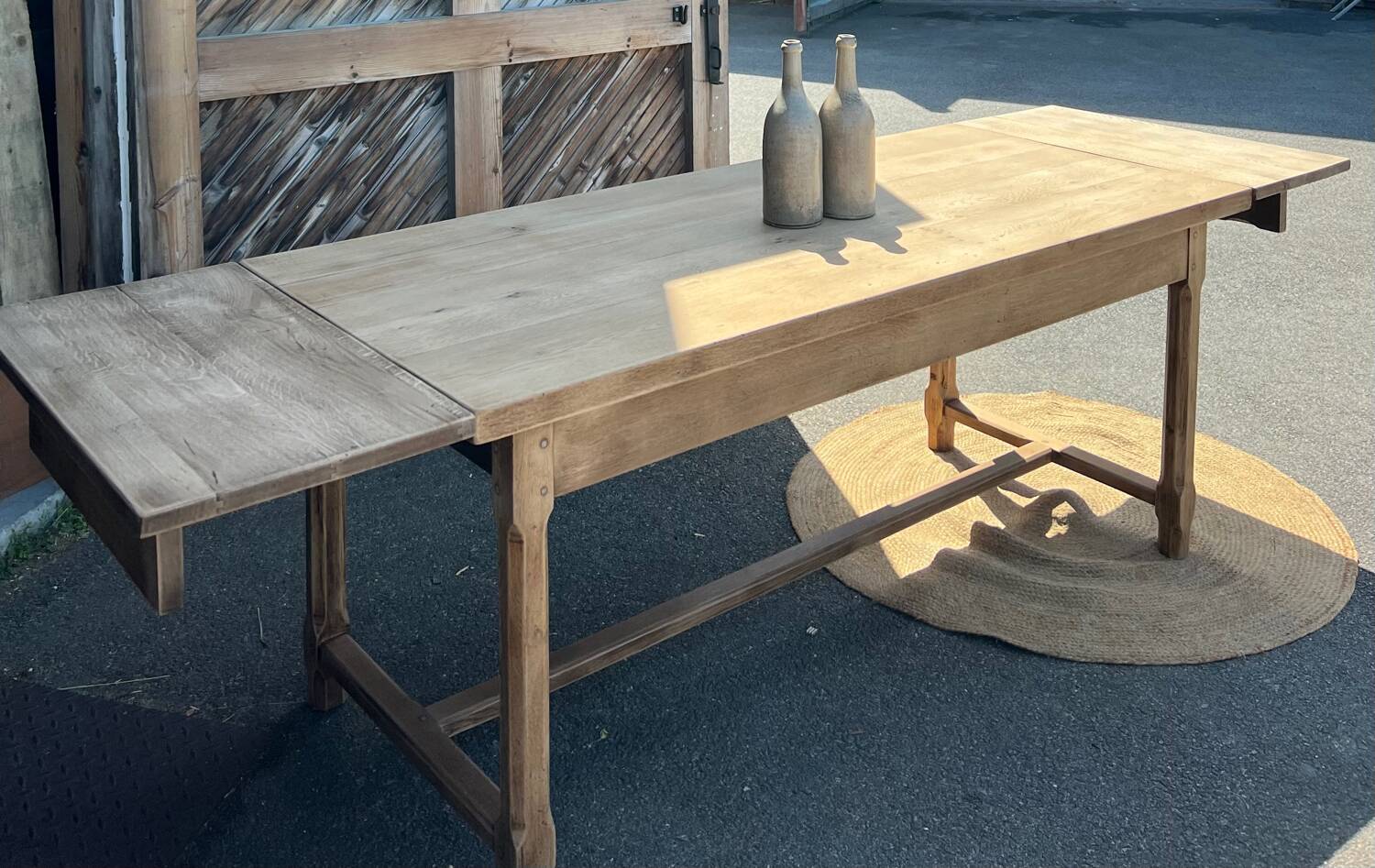 Large renovated antique table with 2 extensions in raw solid oak.