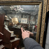 Large antique gilt mirror with scroll and shell decoration, 144 cm