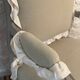 Frilly Regency style bergère armchair