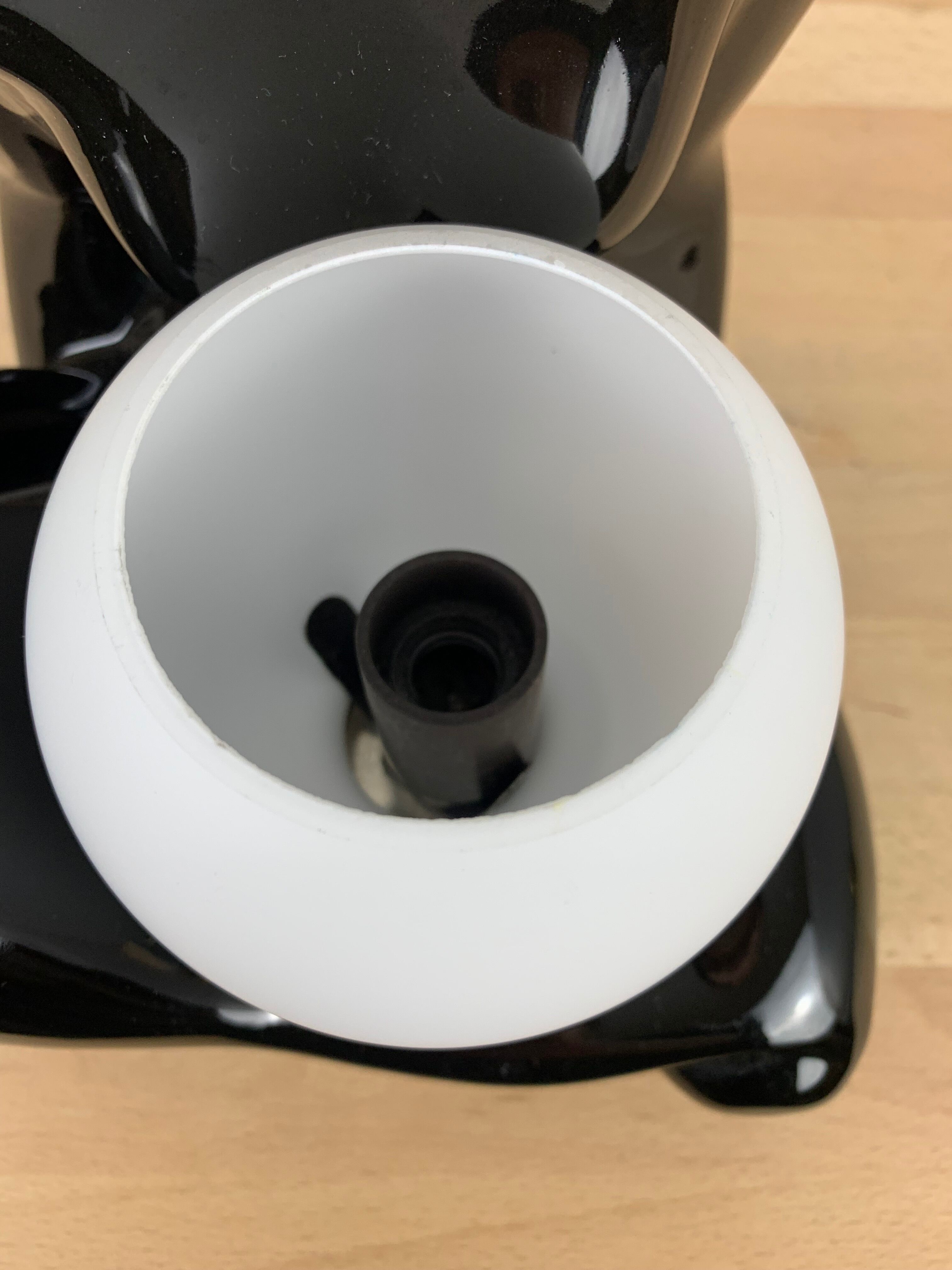 Black ceramic lamp and opal globe