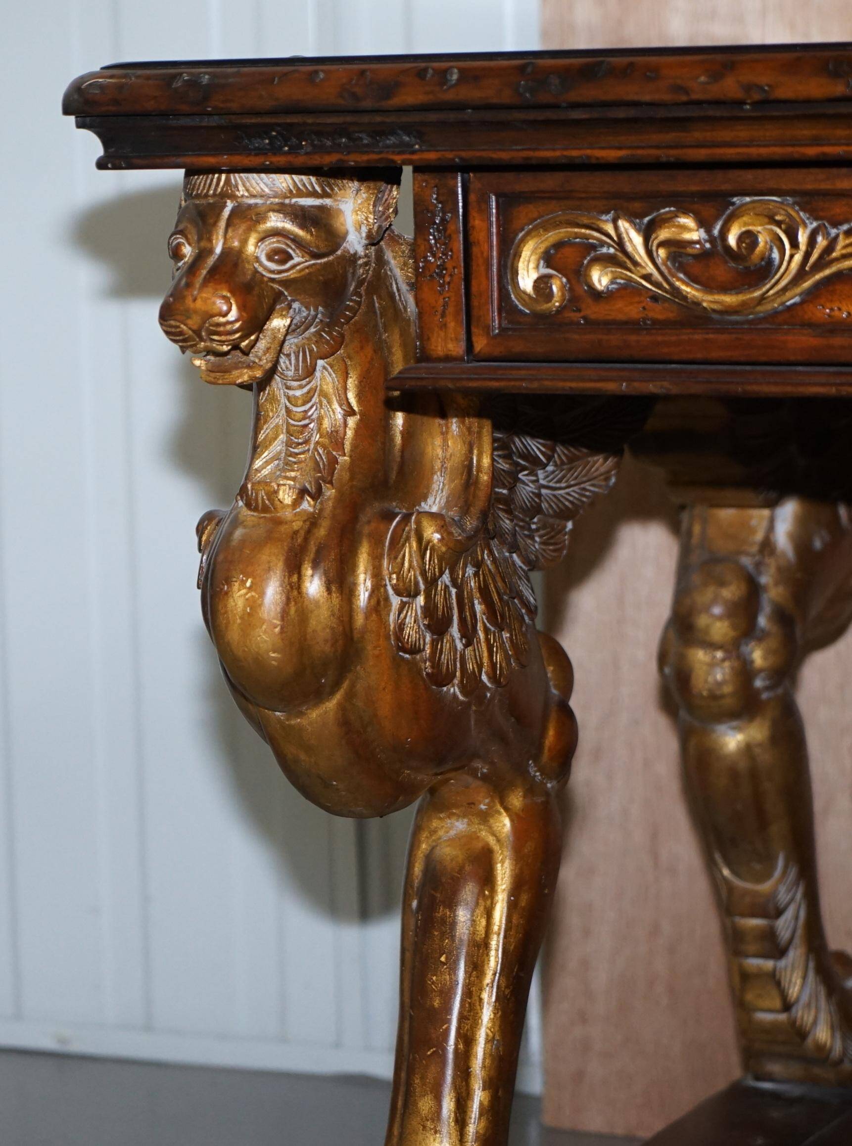 Double-sided writing desk in hardwood with gilt griffins, RJ Horner style.