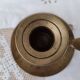 Hand candle holder called cellar rat in solid brass