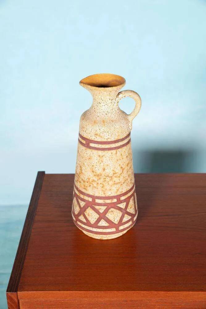 Vintage vase from the 60s, W-Germany footed vase in caramel yellow.