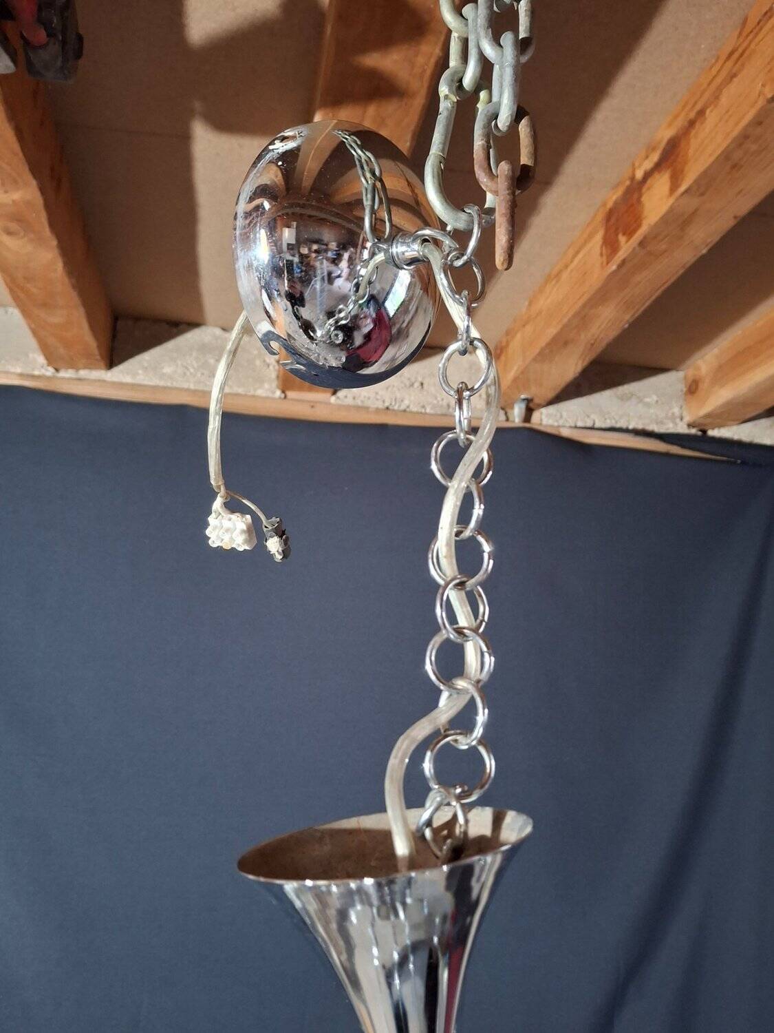 Chandelier from the 1930s to 1950s in chrome metal and thick glass.