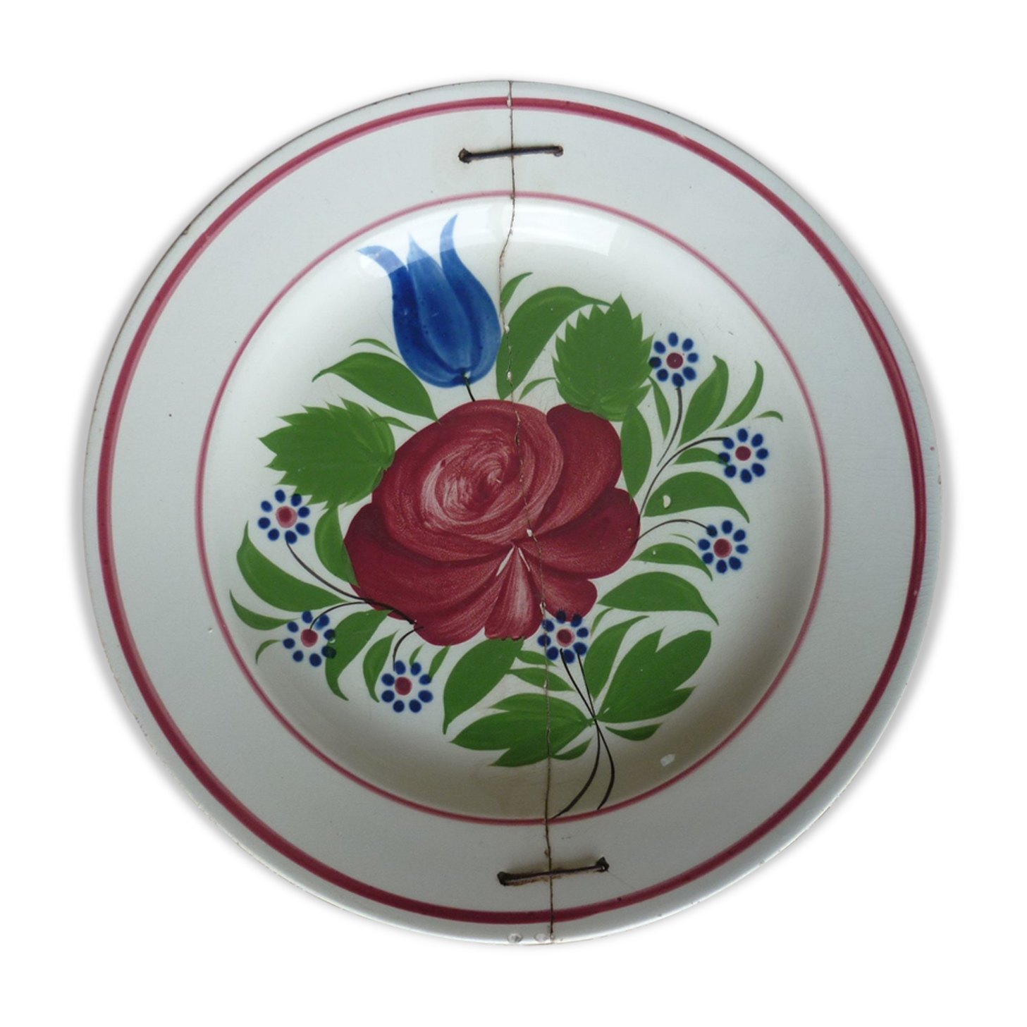 Old repaired plate stapled