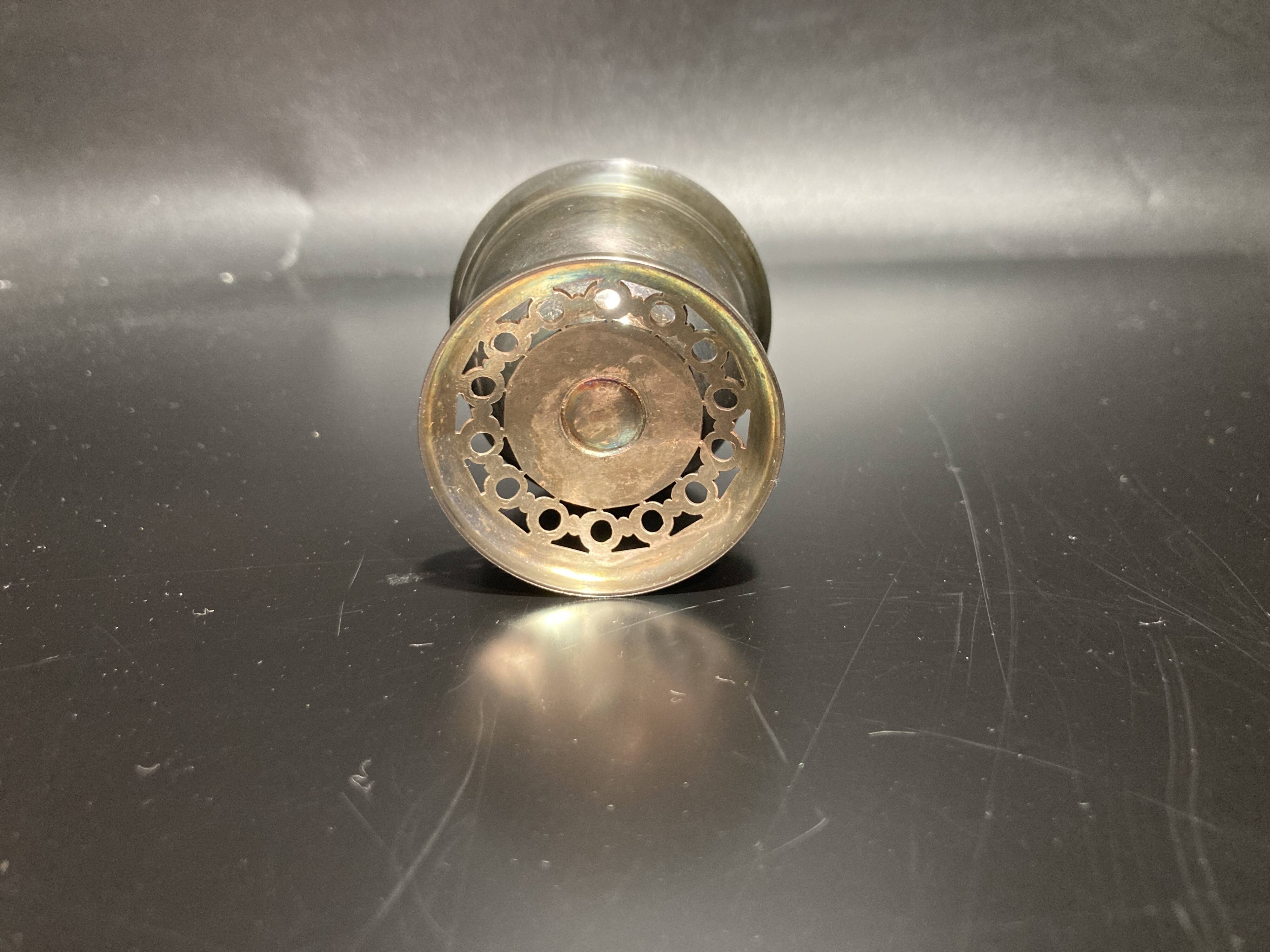 Egg cup with silver metal spoon