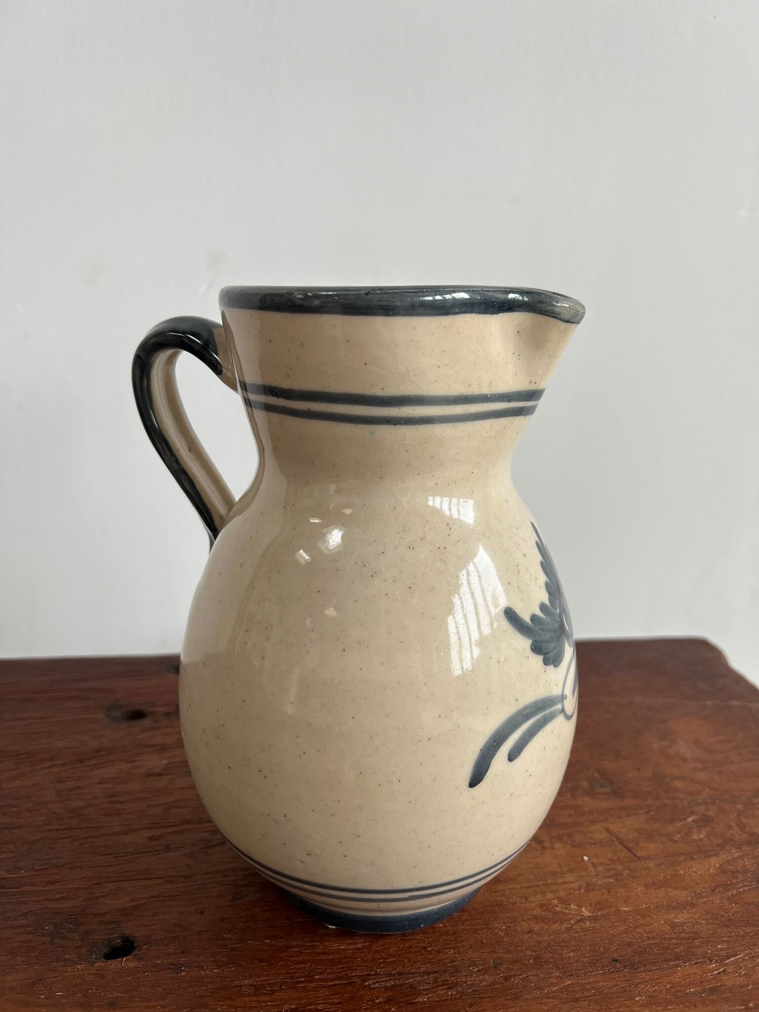 Off-white glossy ceramic decanter, hand-painted gray blue patterns H:20cm