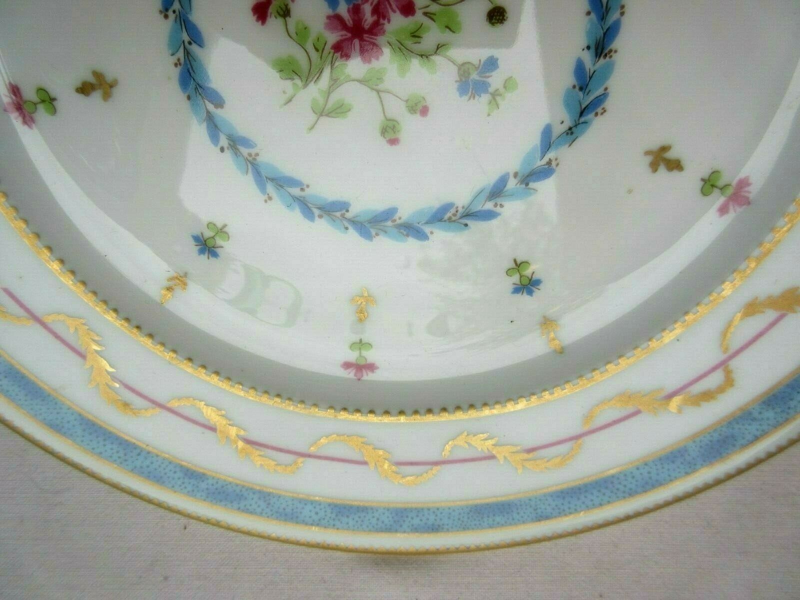 Assiette en porcelaine de Limoges pour Haviland bleue et or