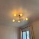 Lustre Cassius with 6 white glass globes and gold metal.