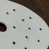 Old iron clay draining plate