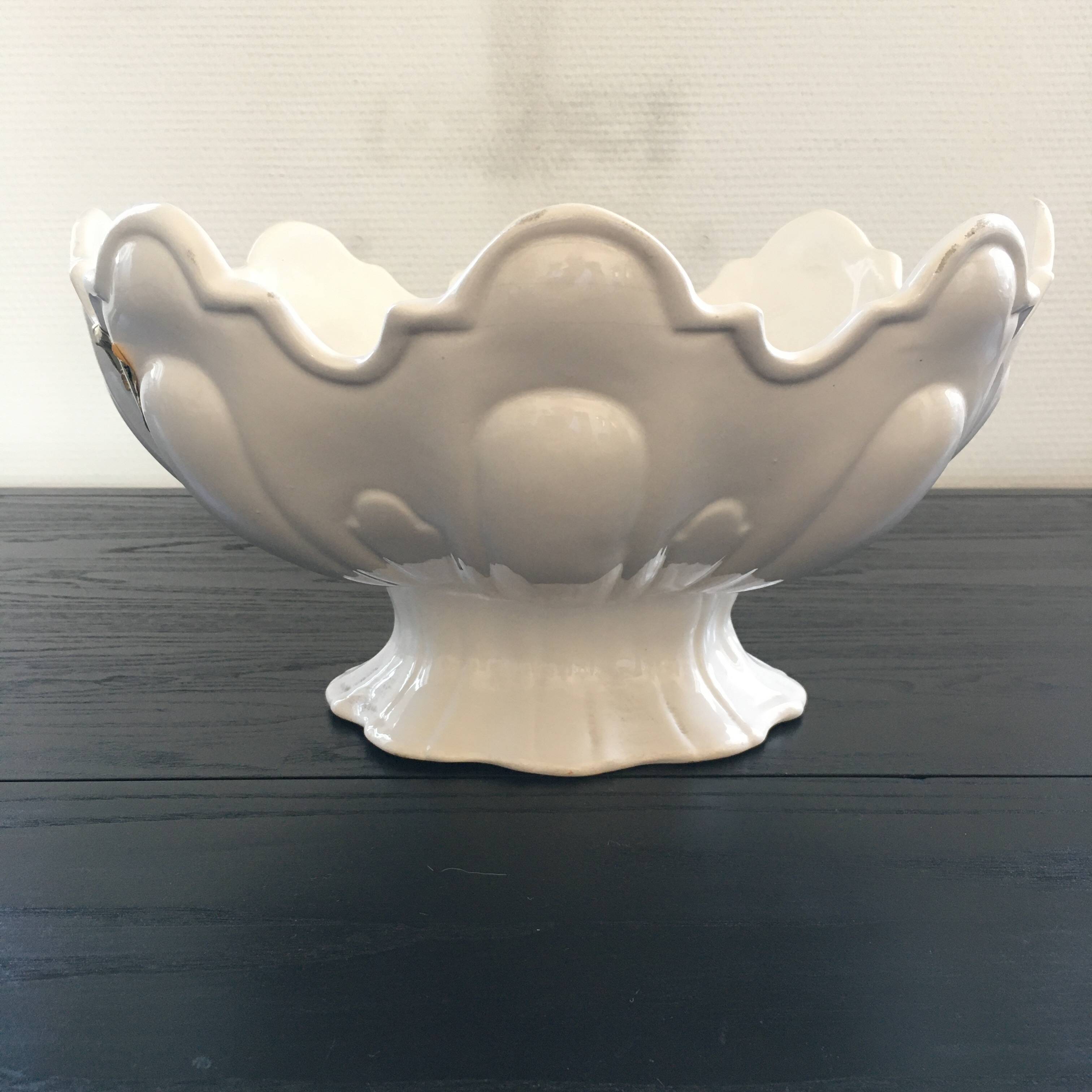 Large white scalloped cup