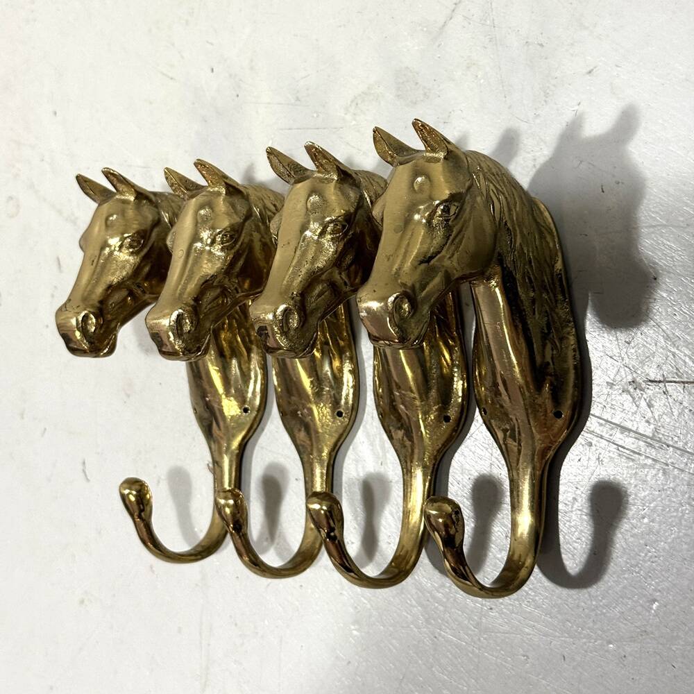 Brass horses coat hooks 1960’s, set of 4