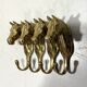 Brass horses coat hooks 1960’s, set of 4